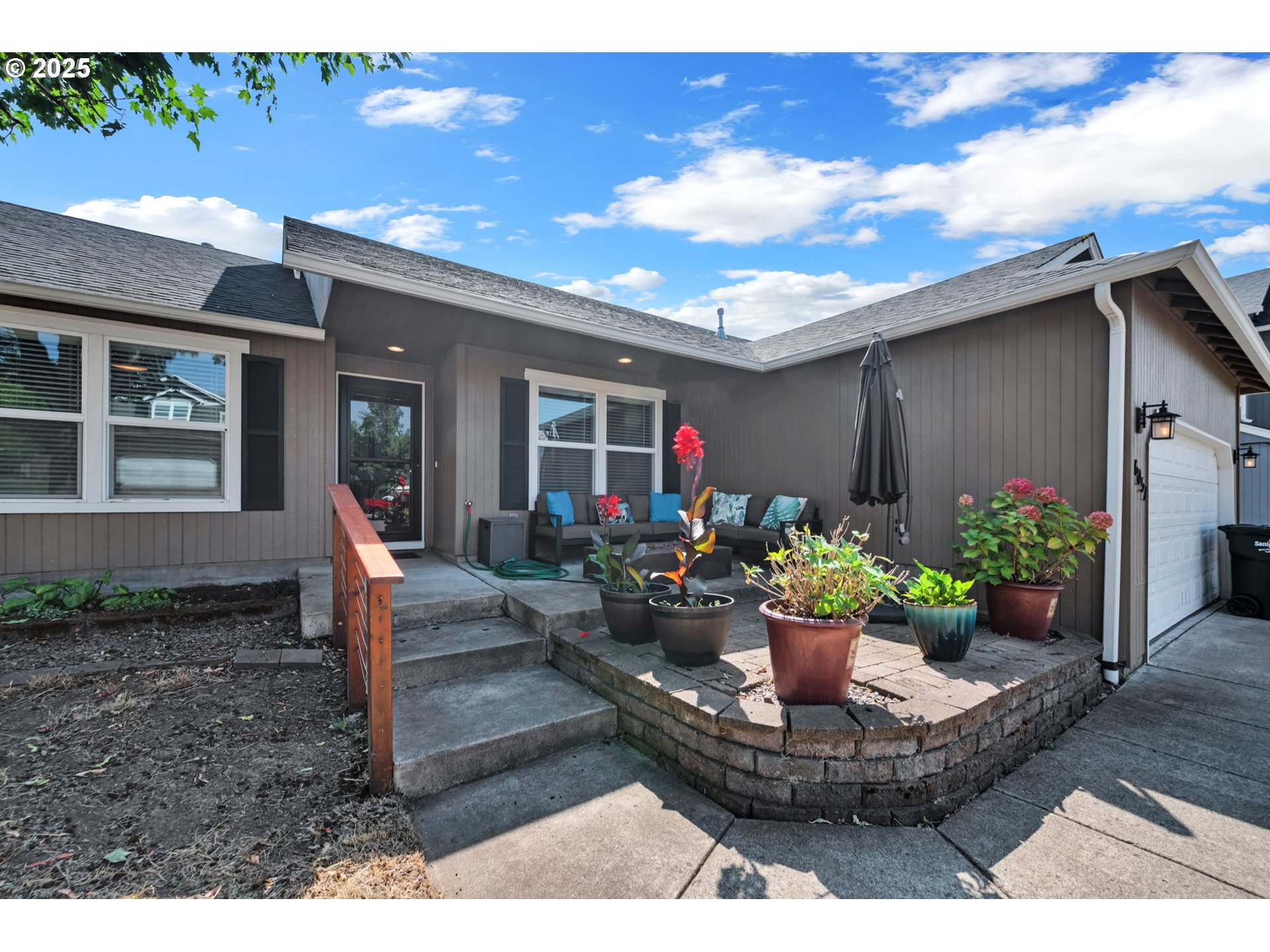 6057 Pebble Court Springfield, OR 97478 - Photo 3 of 42 a view of a house with a patio