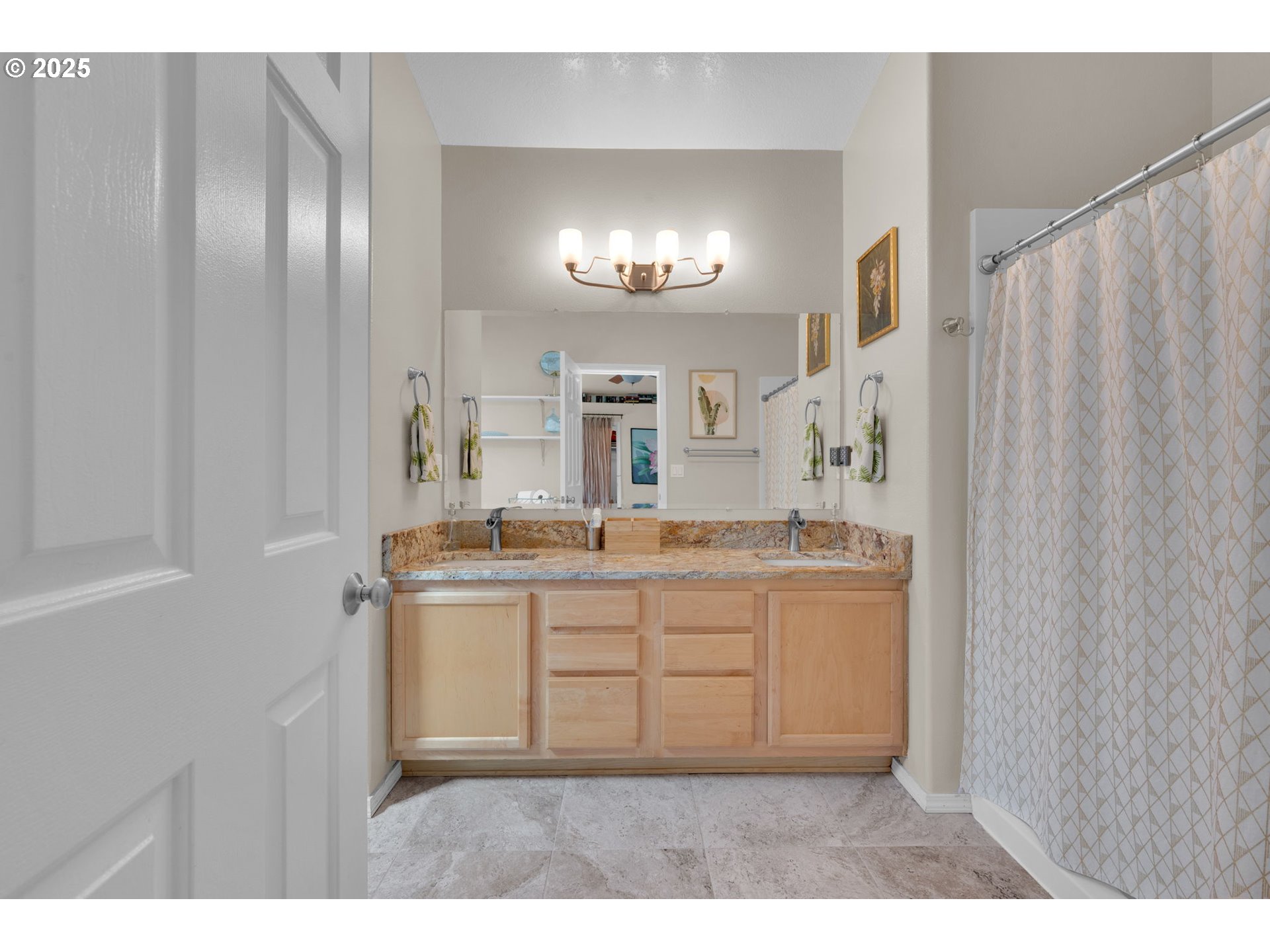 6057 Pebble Court Springfield, OR 97478 - Photo 31 of 42 a bathroom with a sink double vanity and a mirror