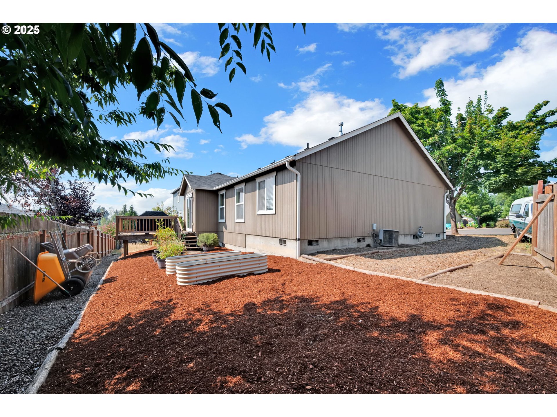 6057 Pebble Court Springfield, OR 97478 - Photo 39 of 42 a view of a house with backyard and sitting area