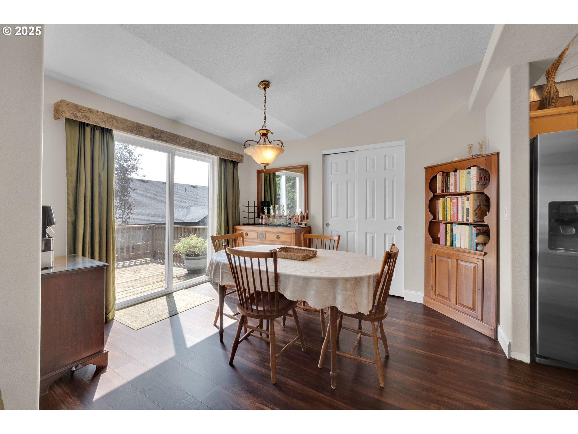 6057 Pebble Court Springfield, OR 97478 - Photo 9 of 42 a view of a dining room with furniture window and wooden floor