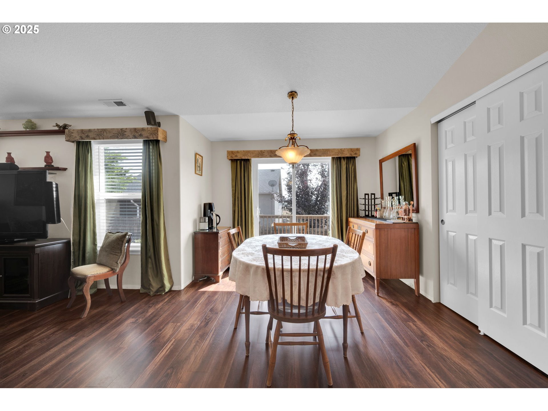 6057 Pebble Court Springfield, OR 97478 - Photo 10 of 42 a dining room with furniture window and wooden floor