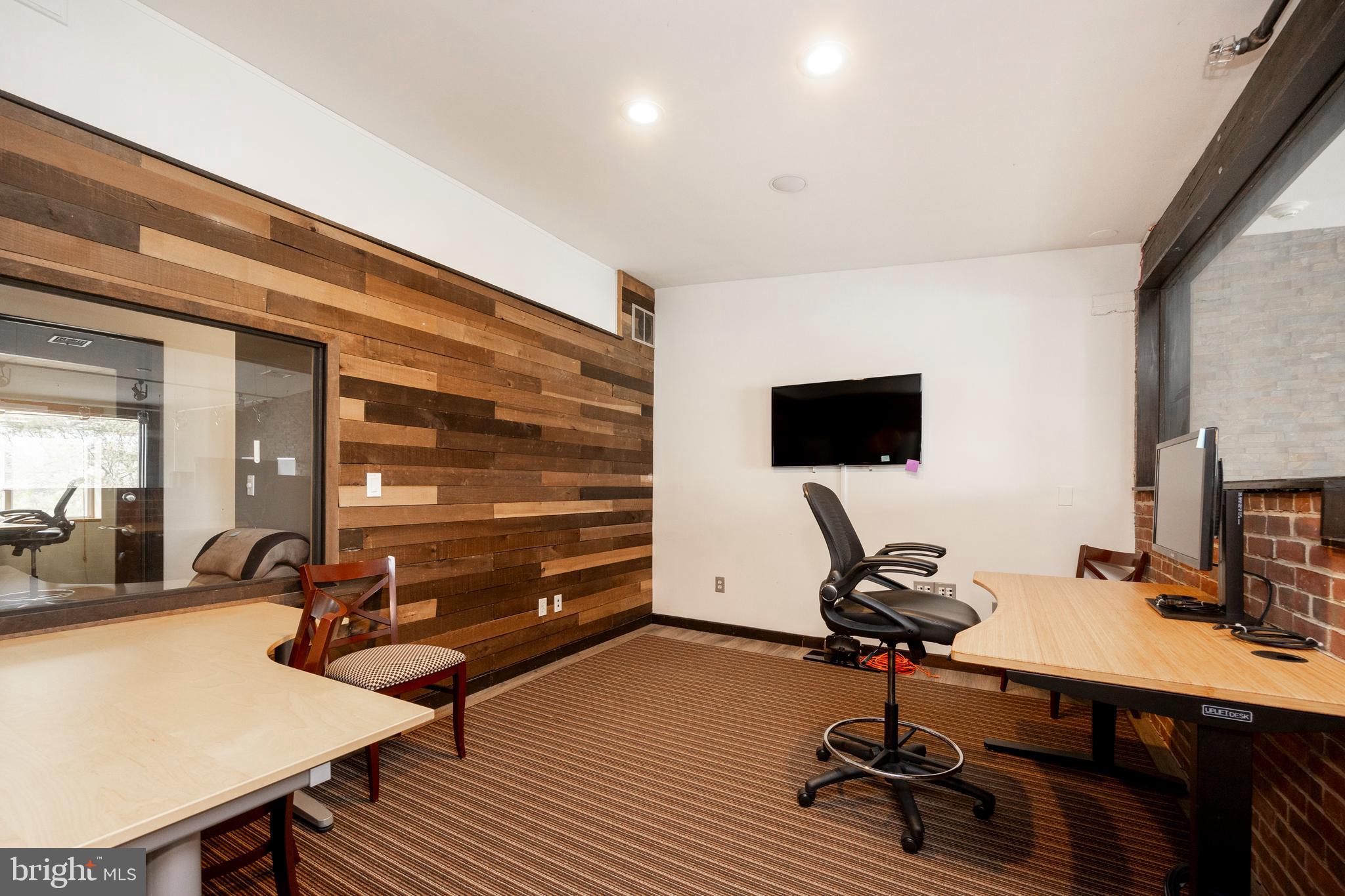 232 Conestoga Road Wayne, PA 19087 - Photo 11 of 34 a view of a workspace with furniture