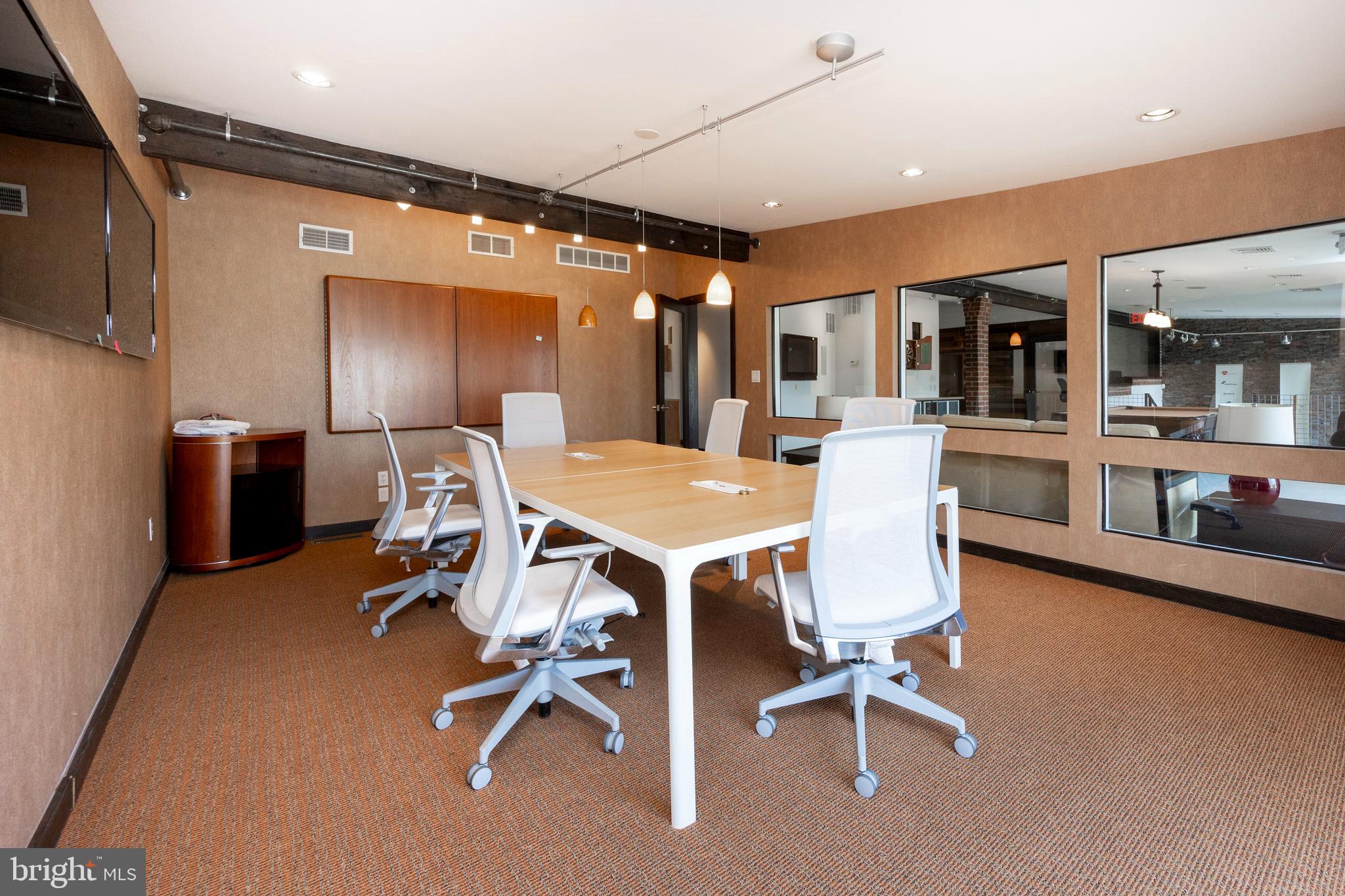 232 Conestoga Road Wayne, PA 19087 - Photo 13 of 34 a view of a dining room with furniture and chandelier