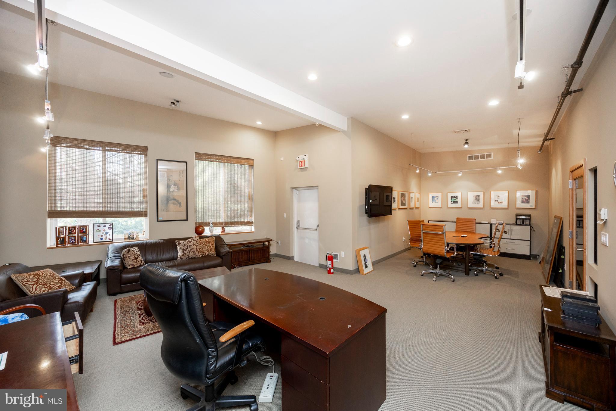 232 Conestoga Road Wayne, PA 19087 - Photo 14 of 34 a living room with furniture and a large window