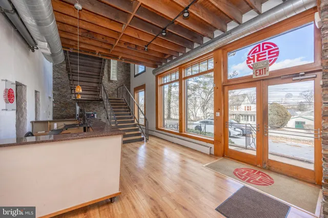 a view of kitchen and wooden floor