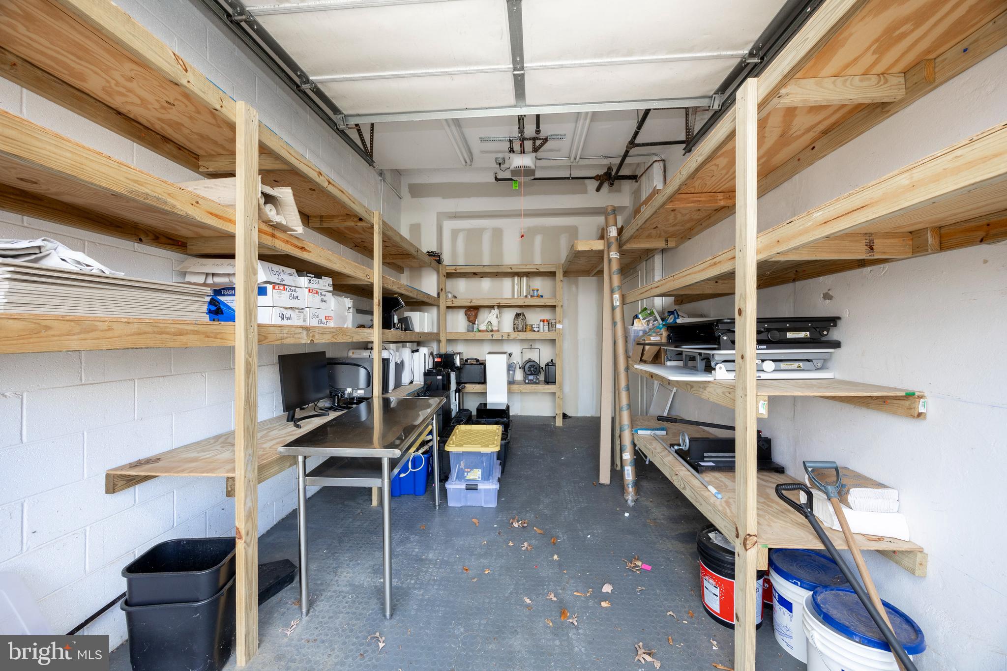 232 Conestoga Road Wayne, PA 19087 - Photo 31 of 34 a view of a storage room with a table and chairs