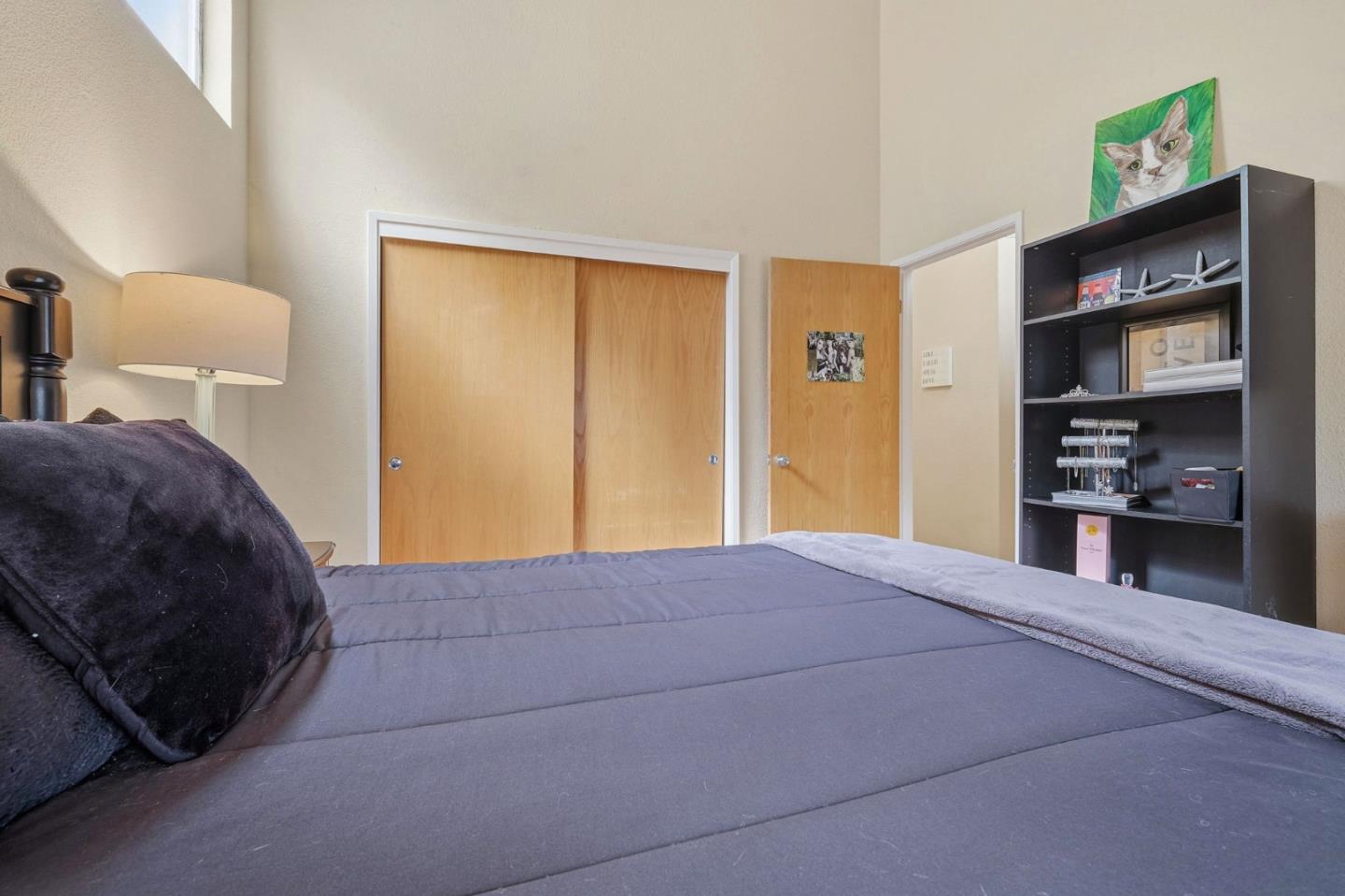 303 Dry Creek Road Aptos, CA 95003 - Photo 27 of 41 a bedroom with a bed and a television