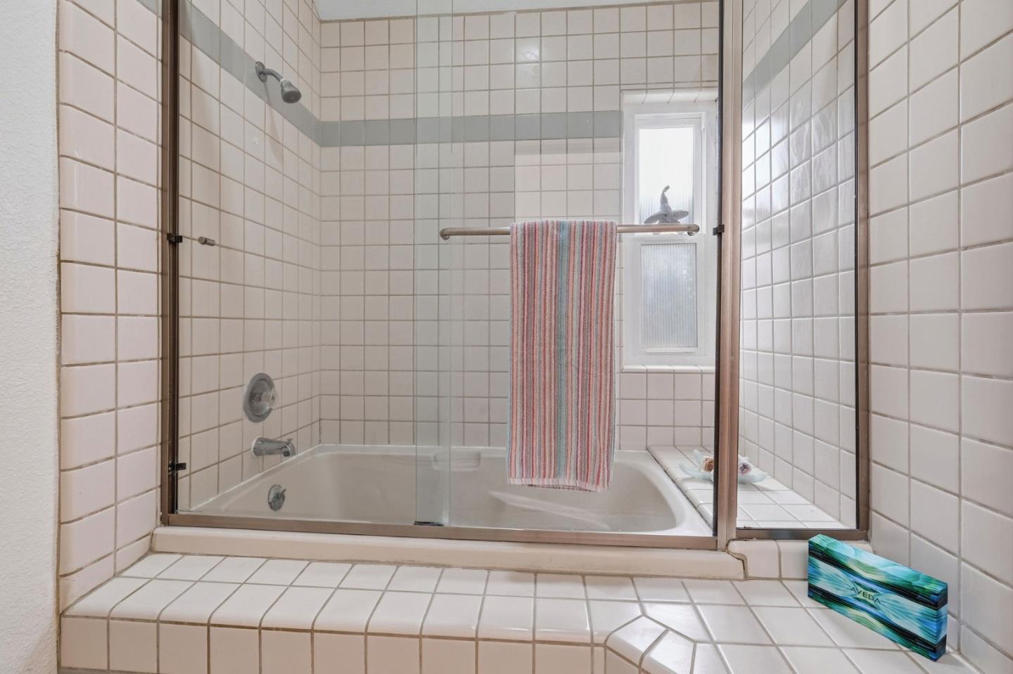 303 Dry Creek Road Aptos, CA 95003 - Photo 31 of 41 a bathroom with a bathtub