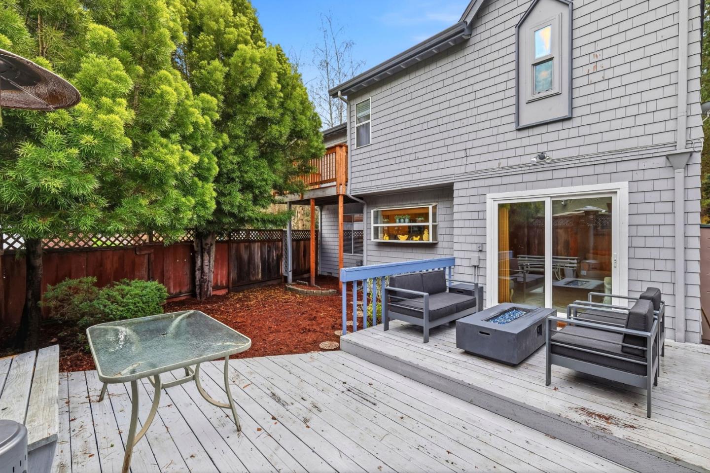 303 Dry Creek Road Aptos, CA 95003 - Photo 38 of 41 a backyard of a house with seating space