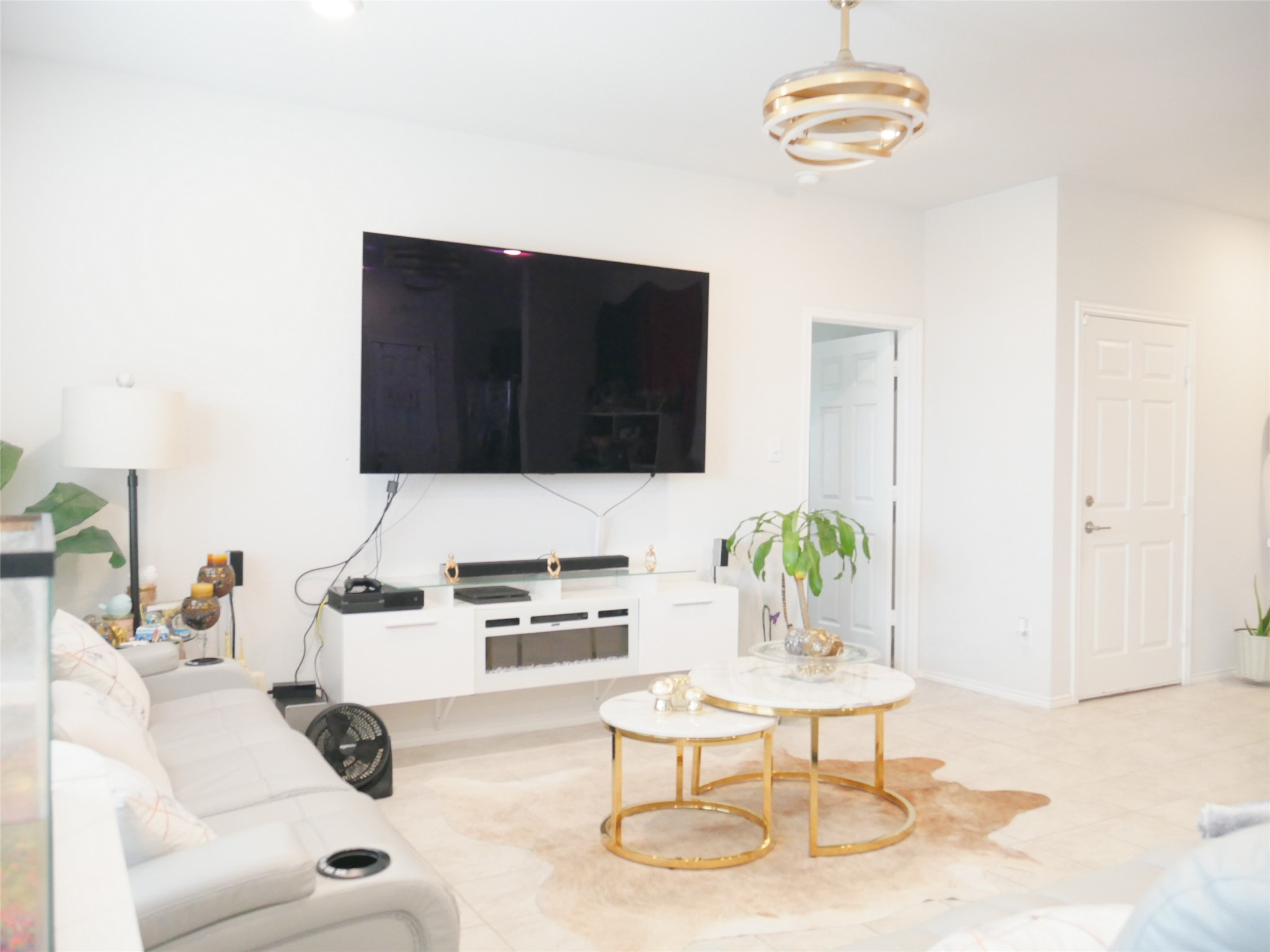 524 Taggart Trail Jarrell, TX 76537 - Photo 5 of 18 a living room with furniture a rug and white walls