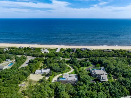 a view of a city with an ocean