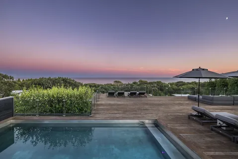 a view of a lake with a mountain