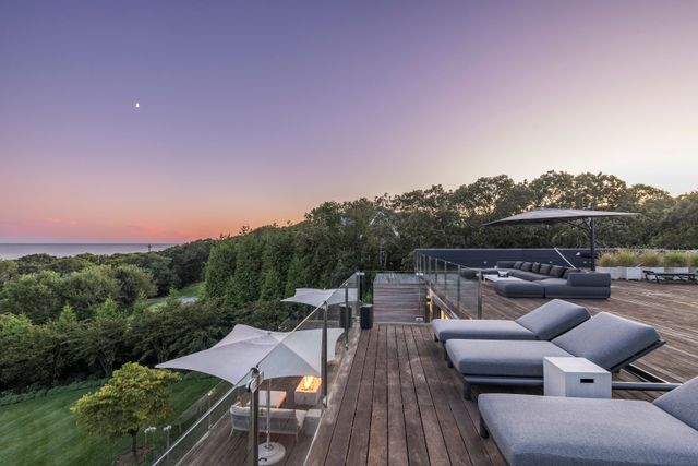 a view of a terrace with sitting area