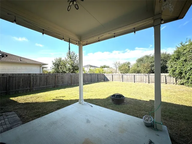 a view of a swimming pool with a porch