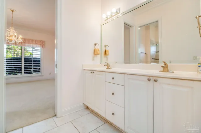 a utility room with sink dryer and washer