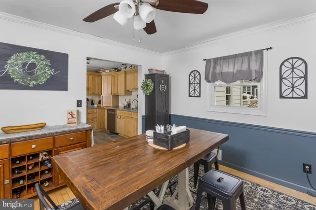 a view of staircase with white walls and a window