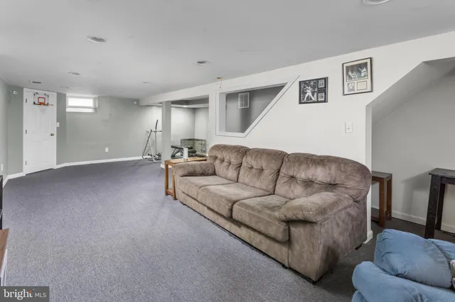 a view of a water fountain in front of a house