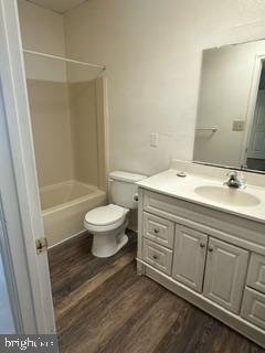 21614 Great Mills Road, Unit 104 Lexington Park, MD 20653 - Photo 14 of 17 a bathroom with a double vanity sink toilet and shower