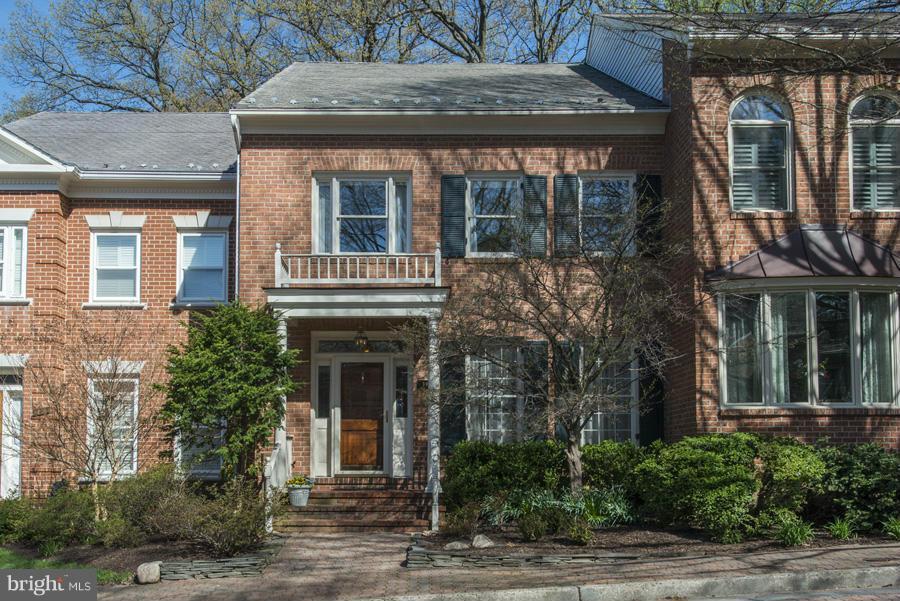 3914 North Glebe Road Arlington, VA 22207 - Photo 1 of 17 a front view of a house with garden