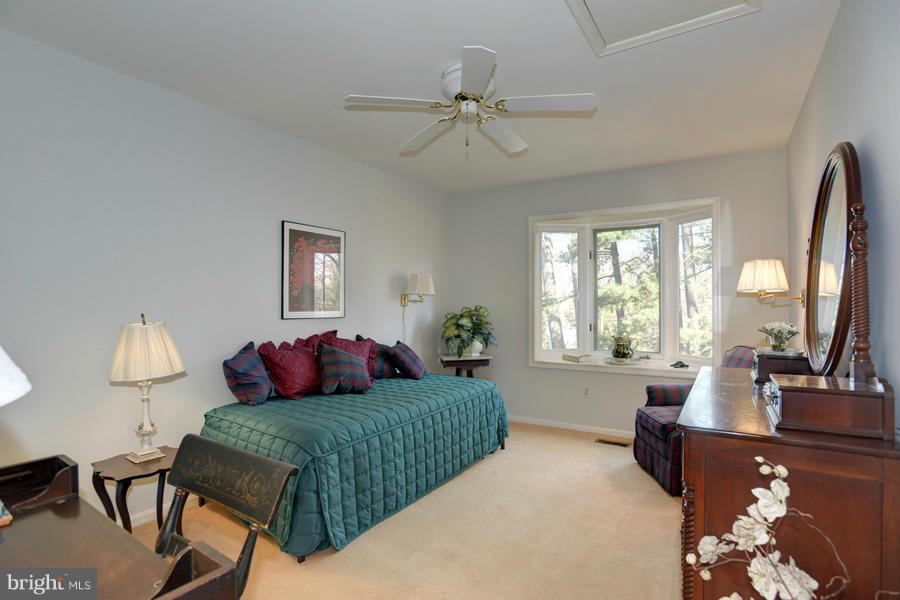 3914 North Glebe Road Arlington, VA 22207 - Photo 12 of 17 a living room with furniture and a large window