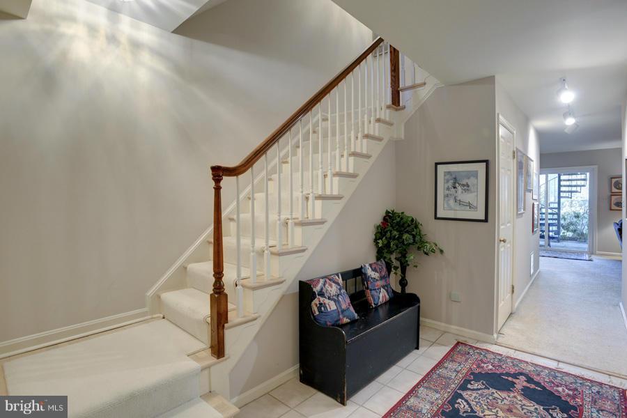 3914 North Glebe Road Arlington, VA 22207 - Photo 13 of 17 a living room with furniture and stairs