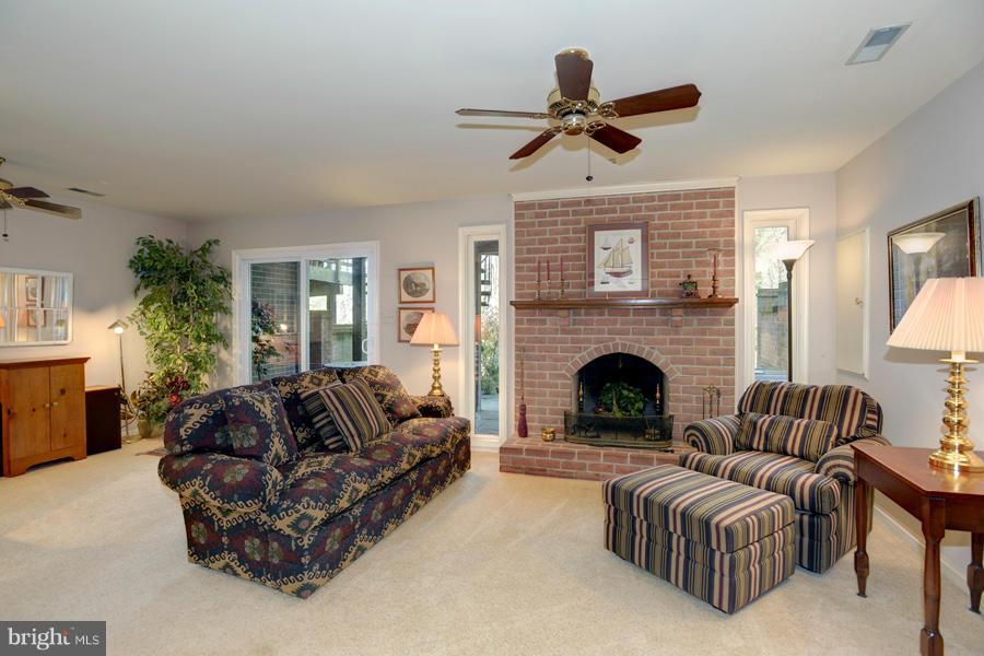 3914 North Glebe Road Arlington, VA 22207 - Photo 14 of 17 a living room with furniture and a fireplace