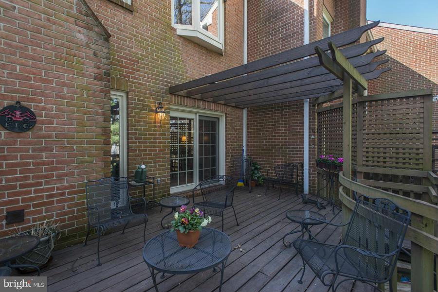 3914 North Glebe Road Arlington, VA 22207 - Photo 16 of 17 a front view of a house with chairs