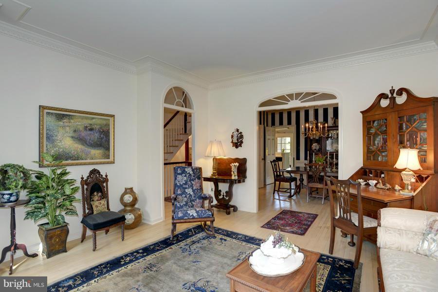 3914 North Glebe Road Arlington, VA 22207 - Photo 5 of 17 a living room with furniture and a table