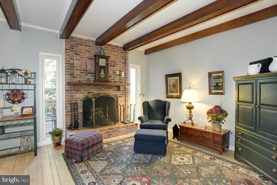 3914 North Glebe Road Arlington, VA 22207 - Photo 9 of 17 a living room with furniture and a fireplace