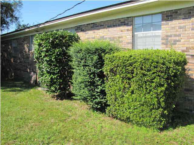 1025 Commonwealth Road Pensacola, FL 32504 - Photo 17 of 25 left side landscaping