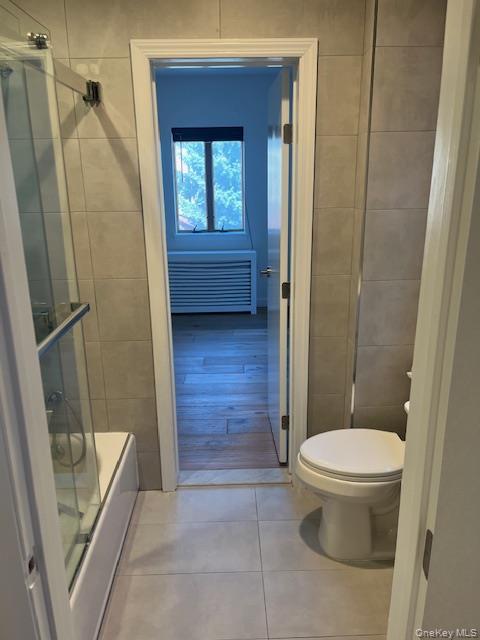 215 Middle Neck Road, Unit 13A Great Neck, NY 11021 - Photo 11 of 20 a bathroom with a toilet and a shower