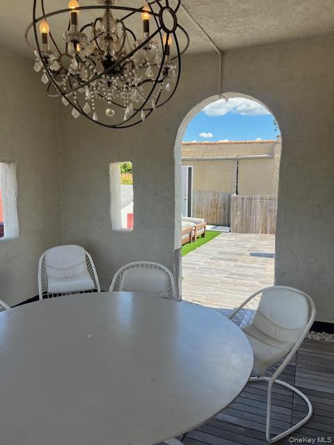 215 Middle Neck Road, Unit 13A Great Neck, NY 11021 - Photo 15 of 20 a view of a dining room with furniture