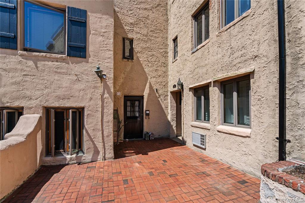 215 Middle Neck Road, Unit 13A Great Neck, NY 11021 - Photo 19 of 20 a house view with a outdoor space