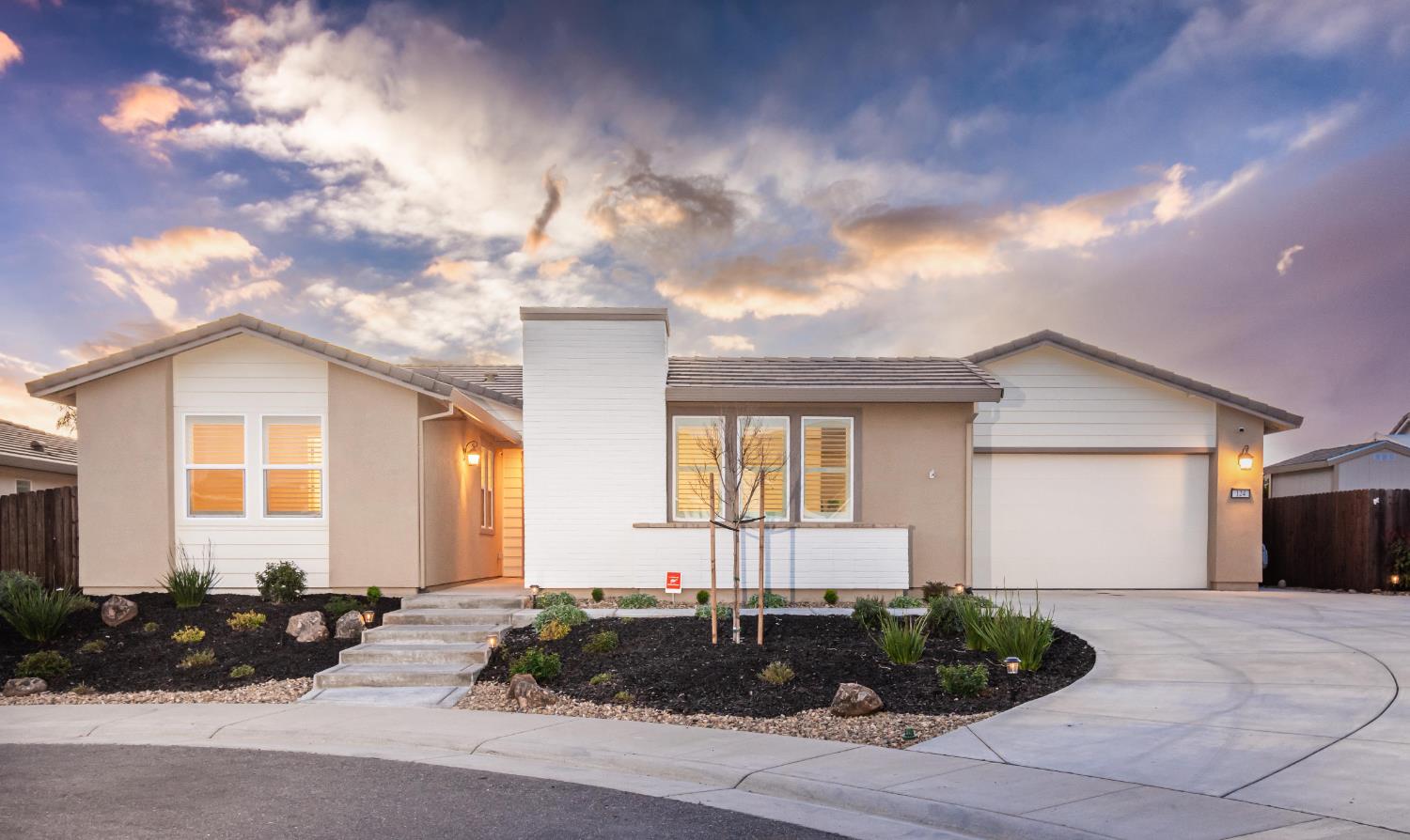 124 Basile Court Lincoln, CA 95648 - Photo 2 of 55 view of front of property featuring concrete driveway, an attached garage, stucco siding, and a tiled roof