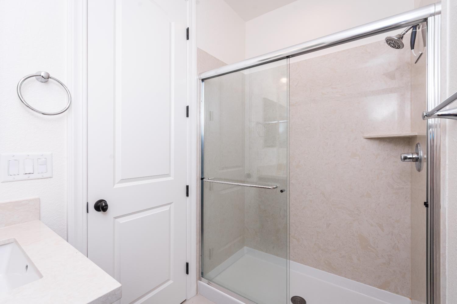 124 Basile Court Lincoln, CA 95648 - Photo 34 of 55 full bathroom featuring a stall shower and vanity