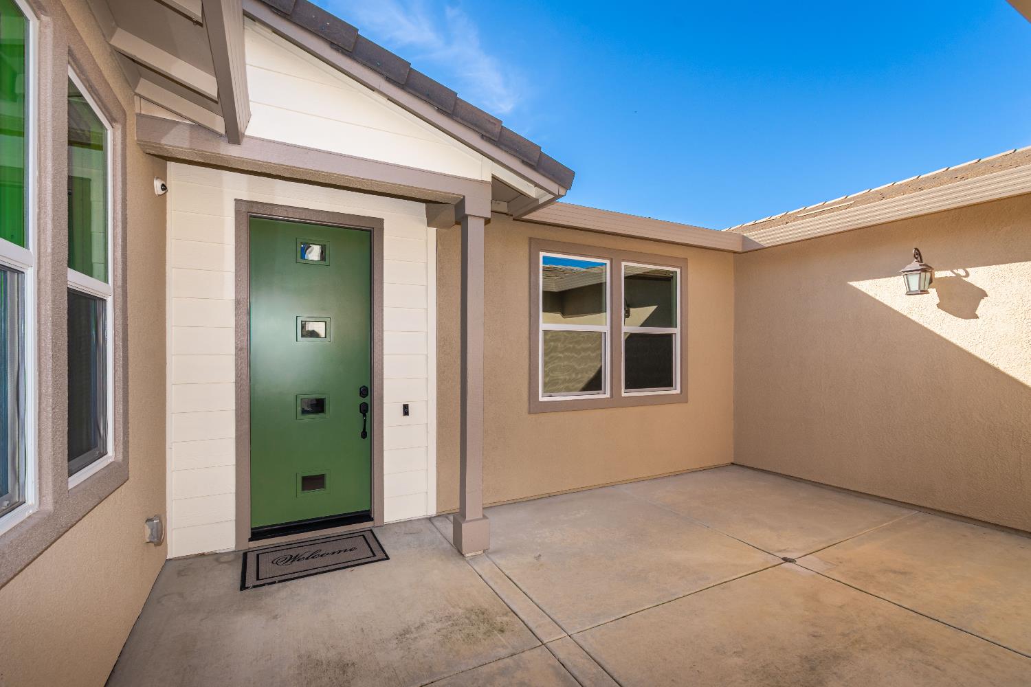 124 Basile Court Lincoln, CA 95648 - Photo 5 of 55 entrance to property with a patio area and stucco siding