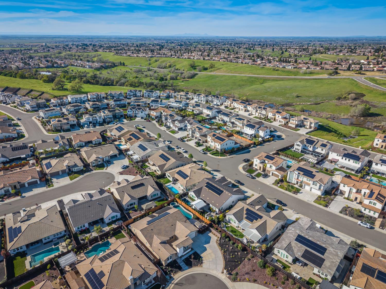 124 Basile Court Lincoln, CA 95648 - Photo 58 of 64 an aerial view of a city and lake view