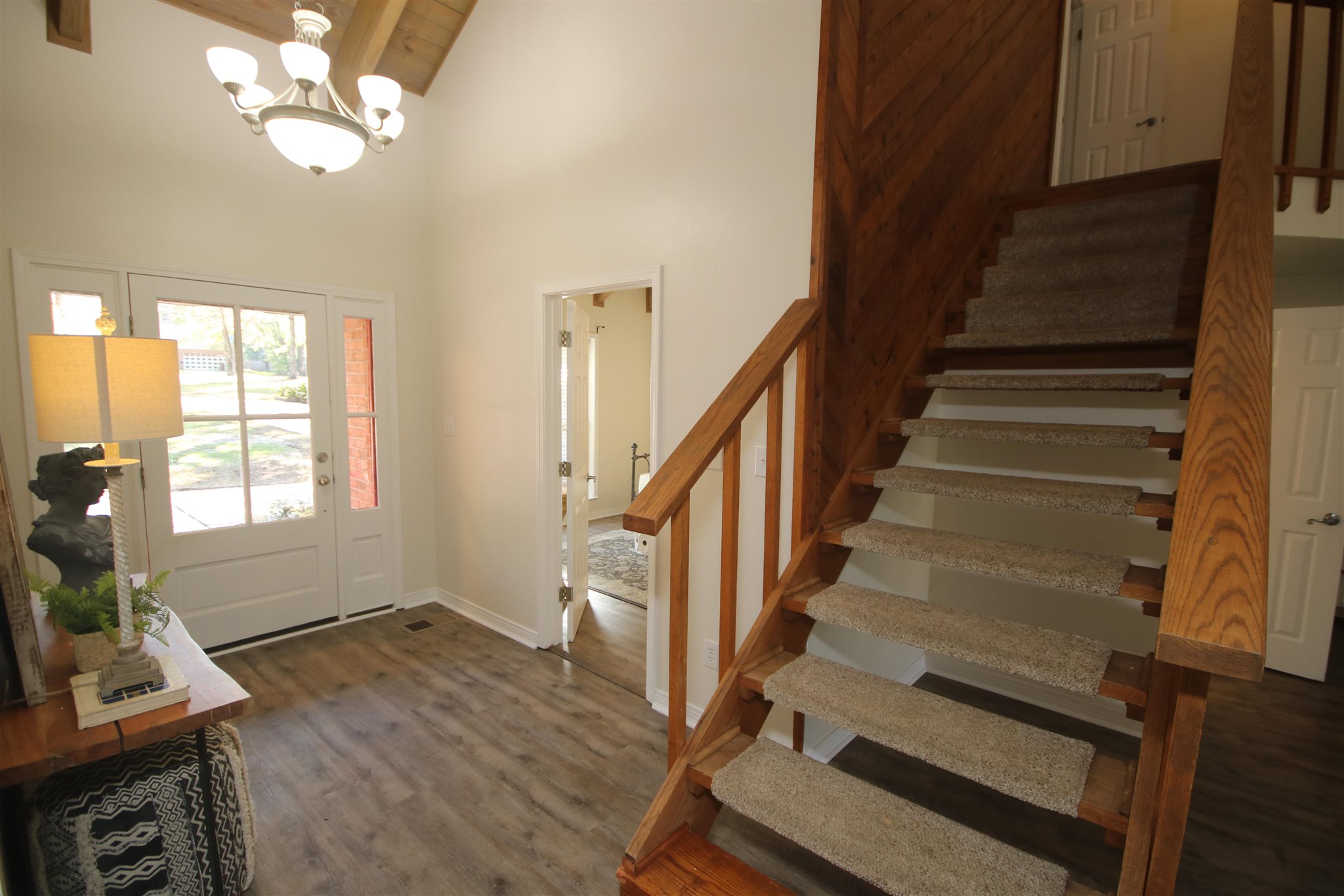 5425 Rowe Trail Pace, FL 32571 - Photo 14 of 50 a view of entryway and hall with wooden floor