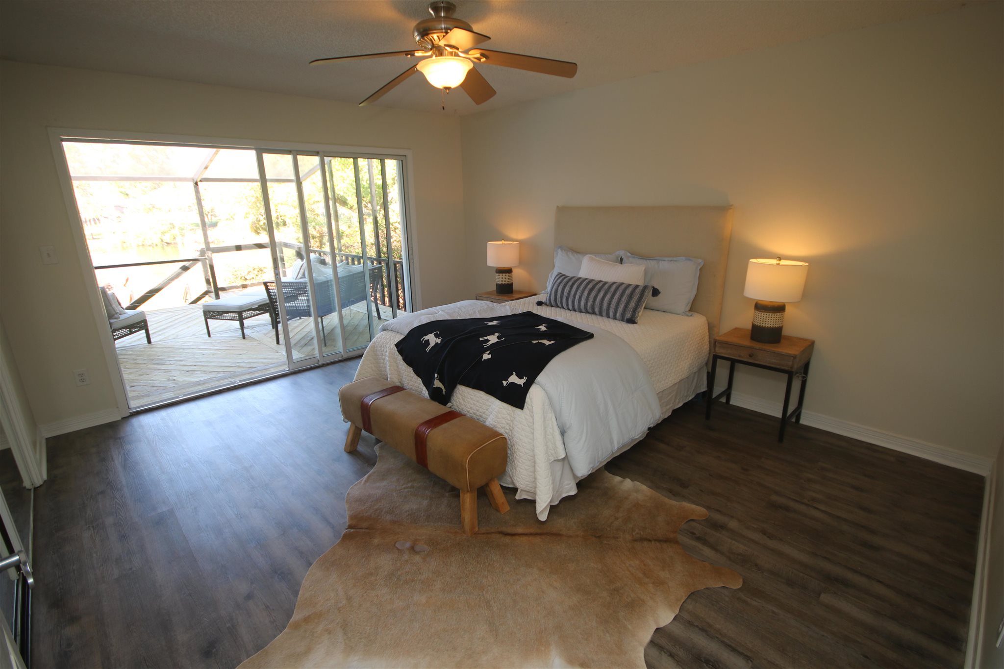 5425 Rowe Trail Pace, FL 32571 - Photo 18 of 50 with lake view. Stacking multi slide glass doors.