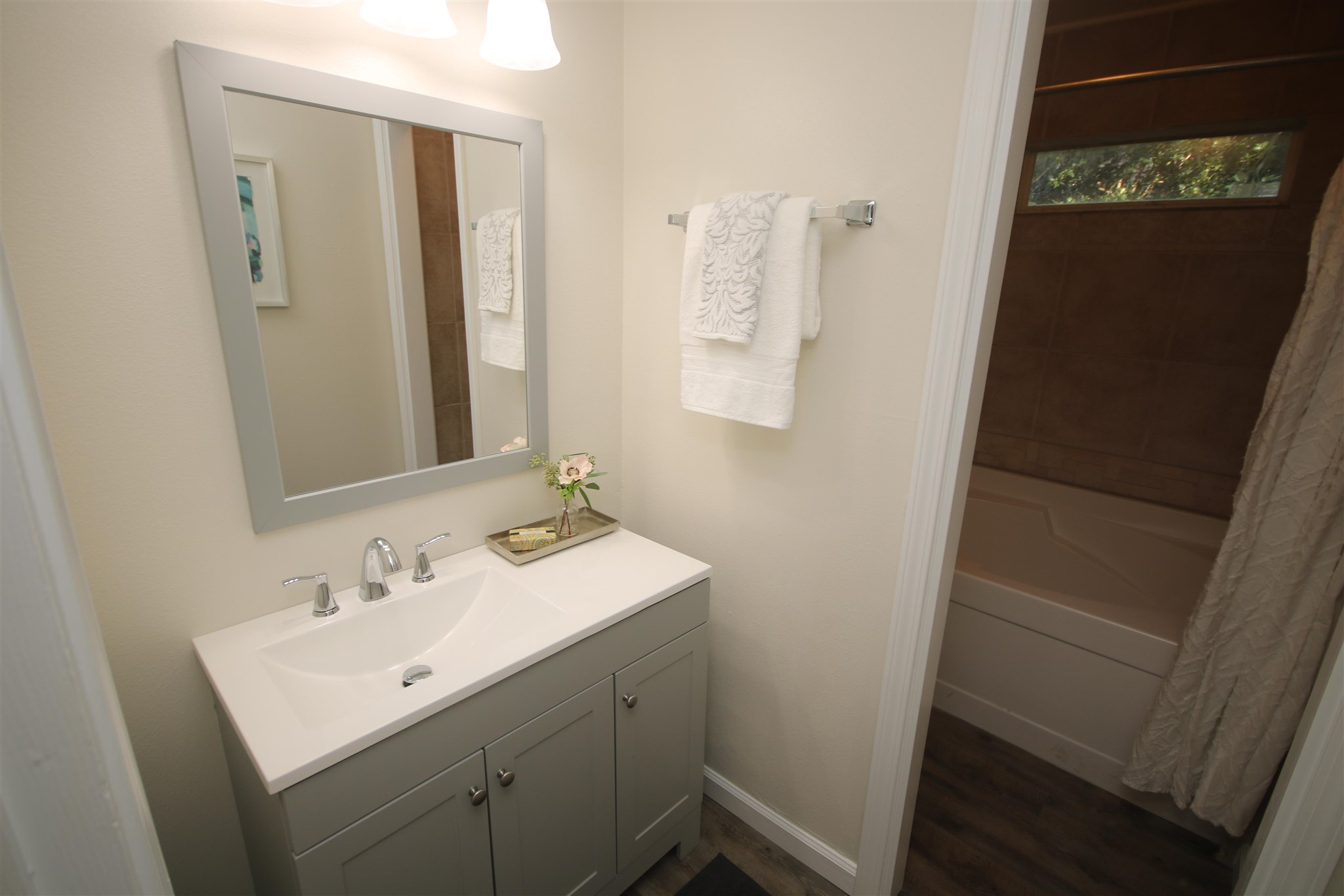 5425 Rowe Trail Pace, FL 32571 - Photo 21 of 50 a bathroom with a sink a mirror and a toilet