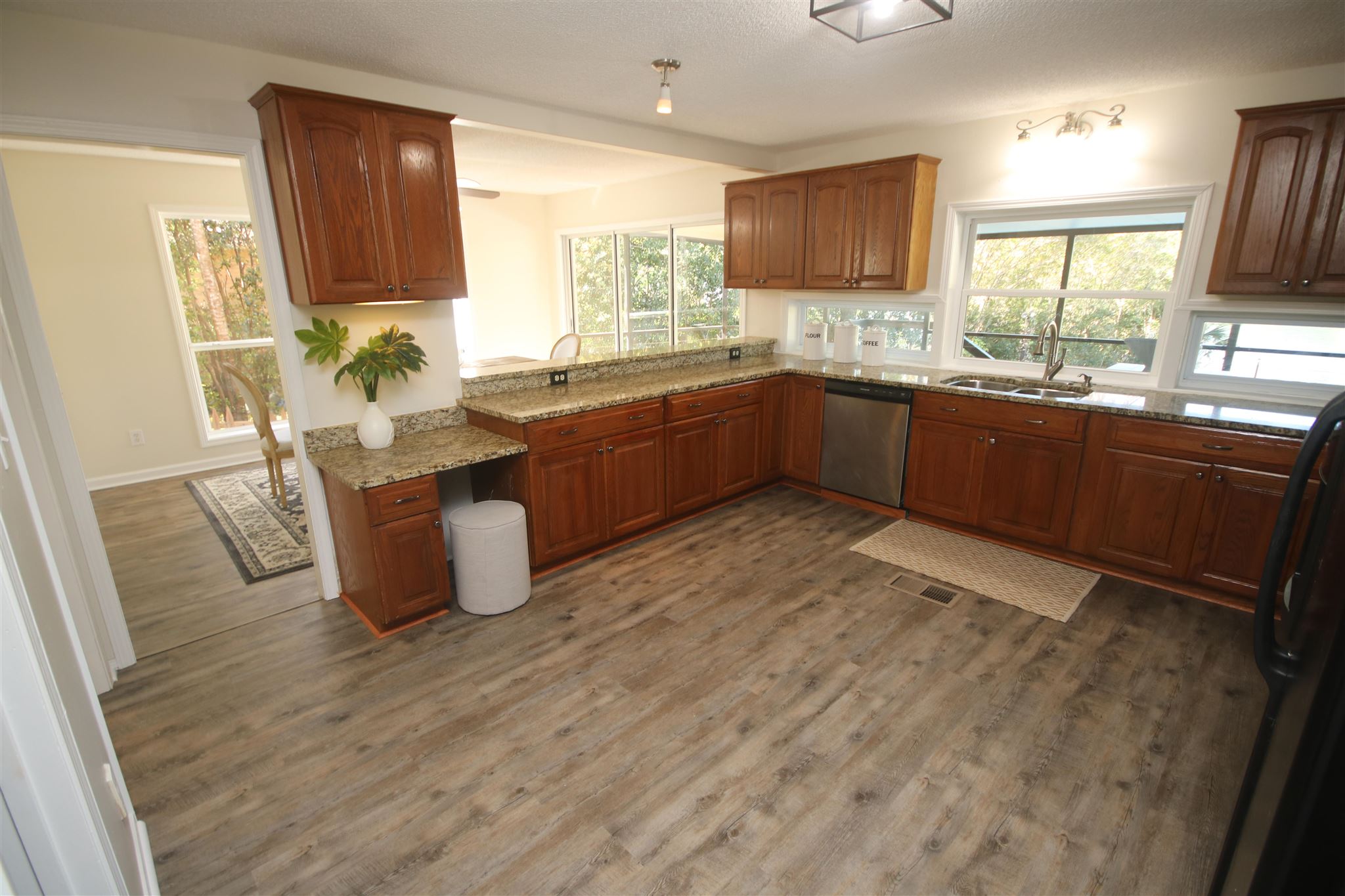 5425 Rowe Trail Pace, FL 32571 - Photo 27 of 50 the kitchen sink. Granite countertops & desk area.