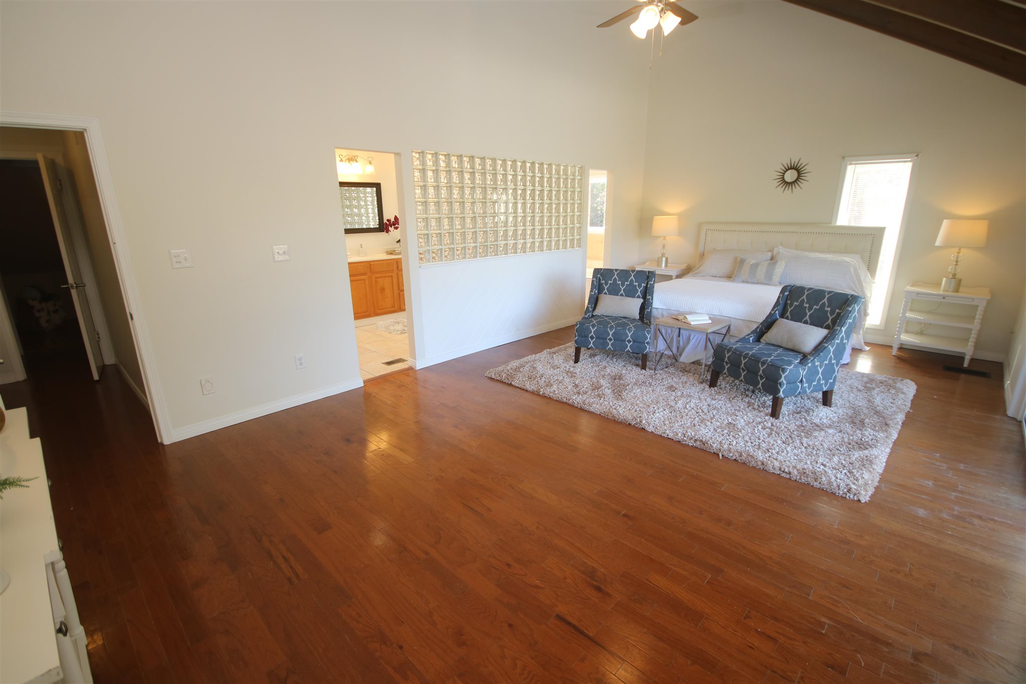 5425 Rowe Trail Pace, FL 32571 - Photo 37 of 50 master bath. Bedroom w/ hardwood flooring.
