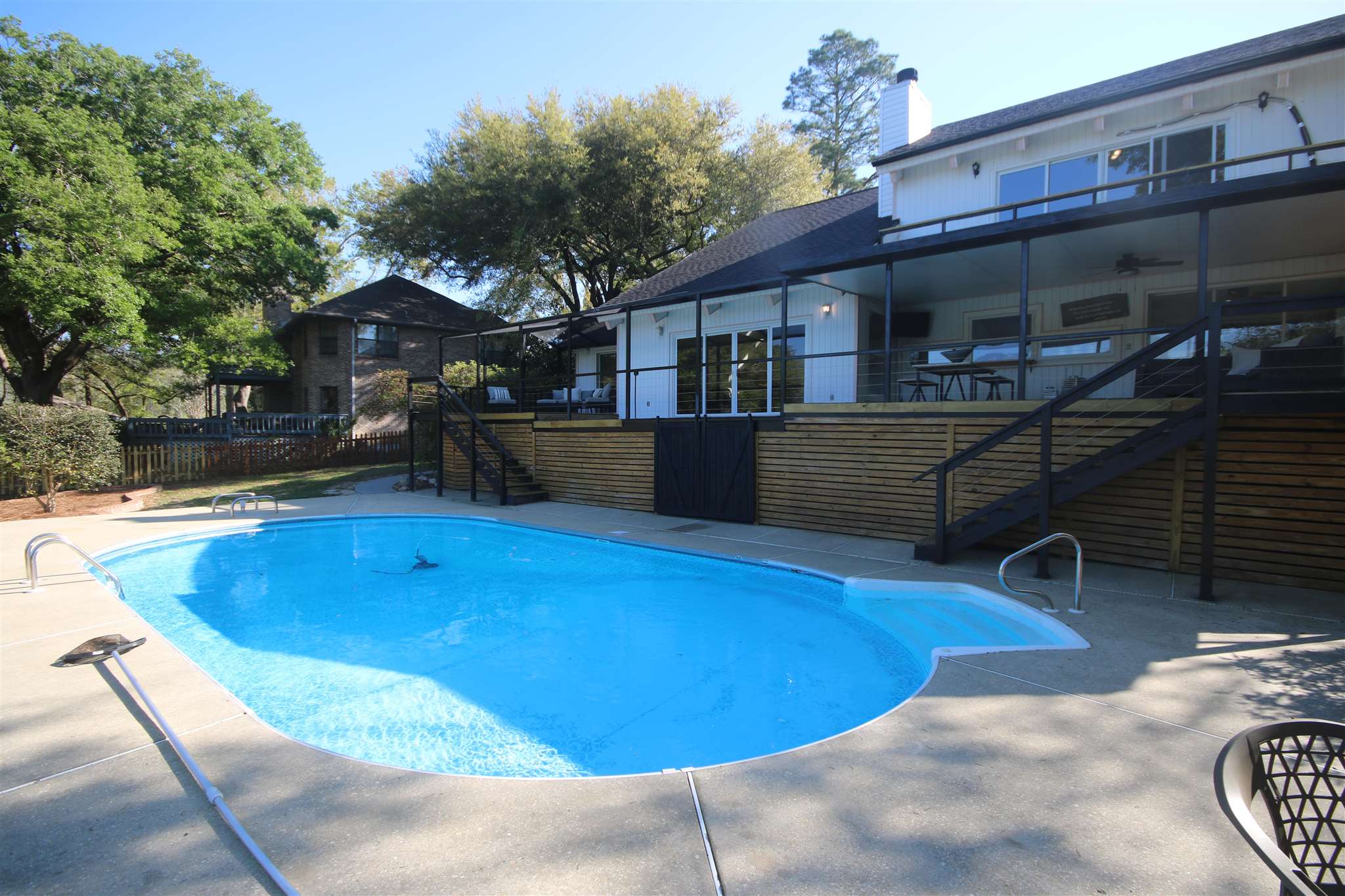 5425 Rowe Trail Pace, FL 32571 - Photo 42 of 50 a view of a house with a swimming pool
