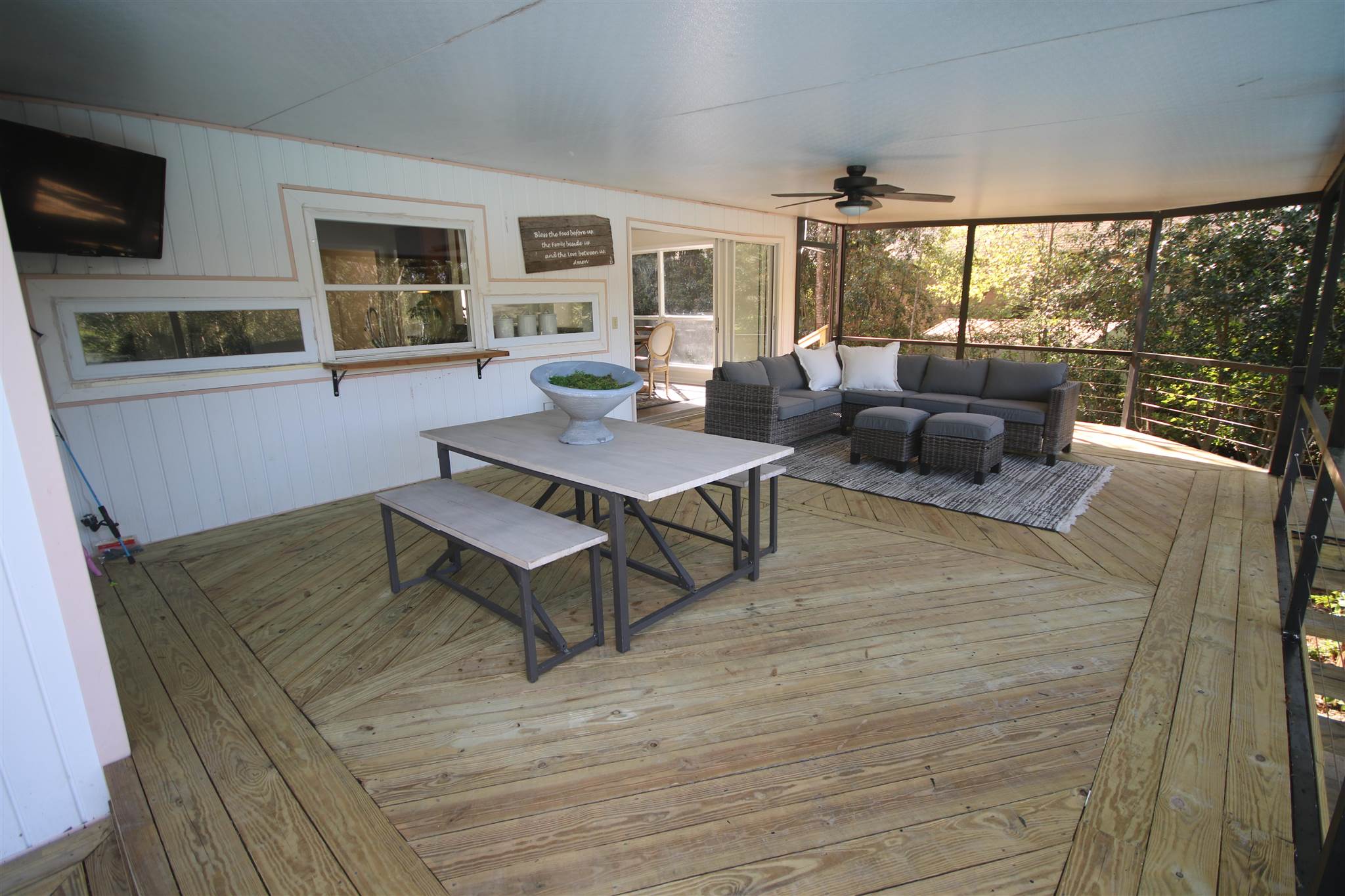 5425 Rowe Trail Pace, FL 32571 - Photo 45 of 50 a living room with furniture and a flat screen tv