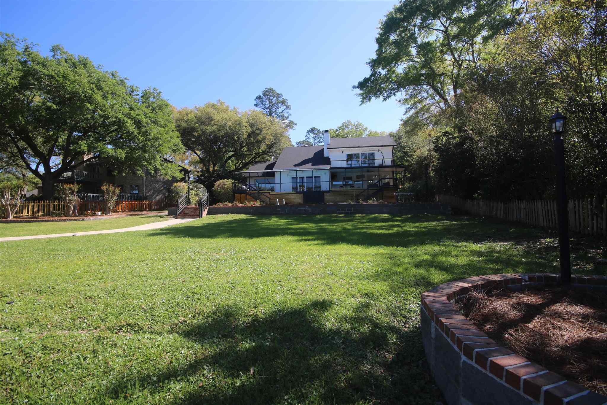 5425 Rowe Trail Pace, FL 32571 - Photo 47 of 50 lake fed. Beautiful & inviting backyard!