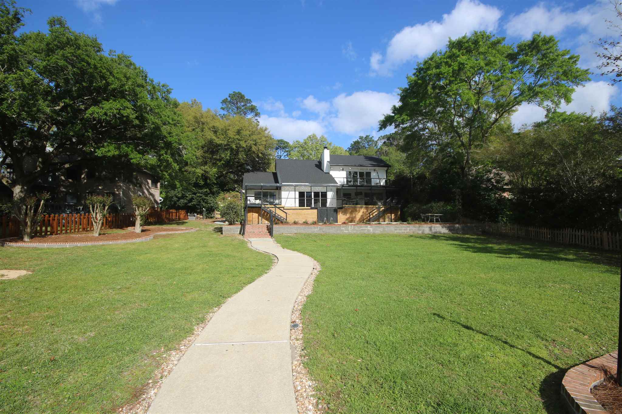 5425 Rowe Trail Pace, FL 32571 - Photo 48 of 50 down to the lake. Landscaping rocks added 2022.