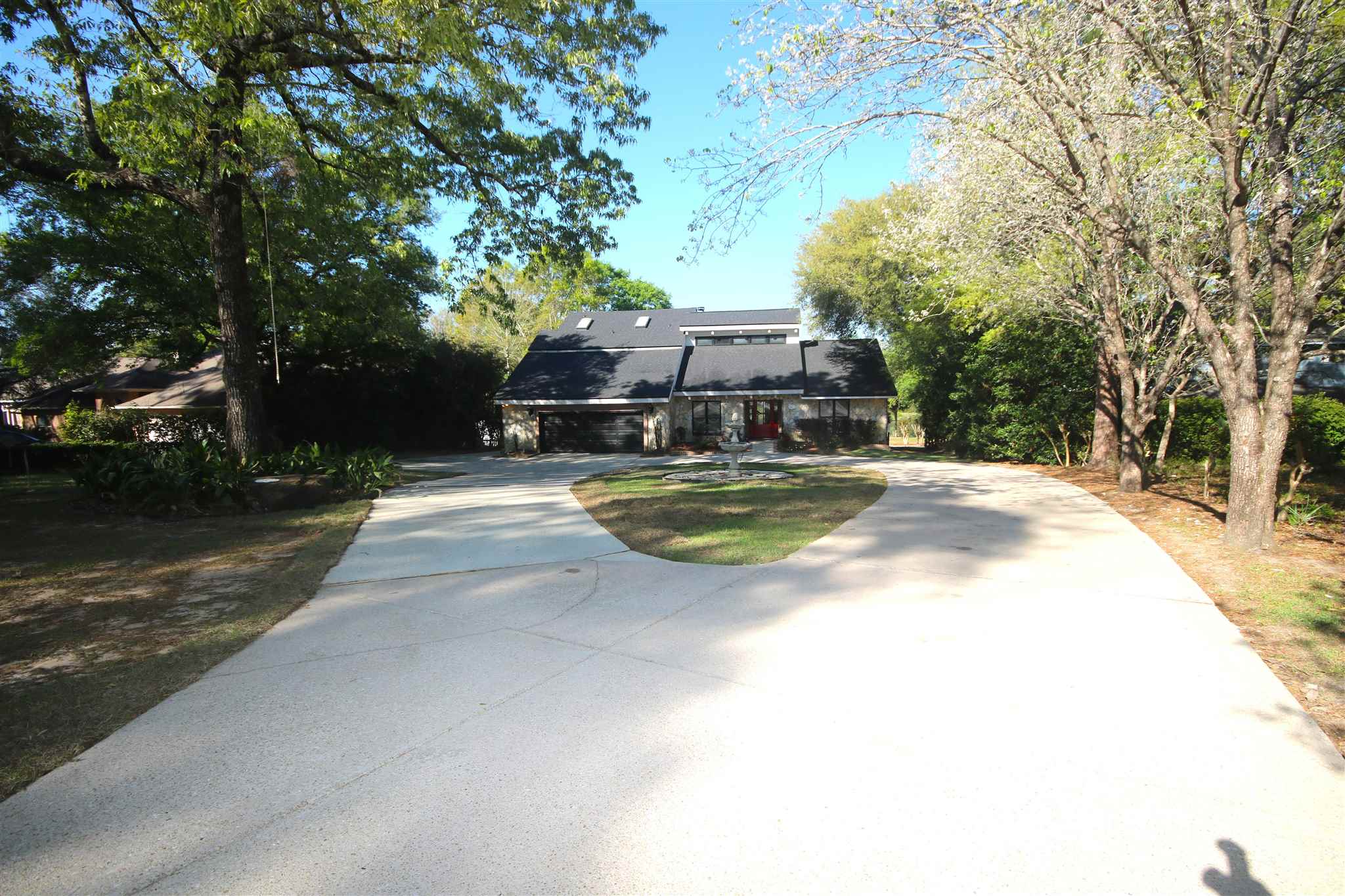 5425 Rowe Trail Pace, FL 32571 - Photo 5 of 50 driveway installed 2022. Some new sod 2023.