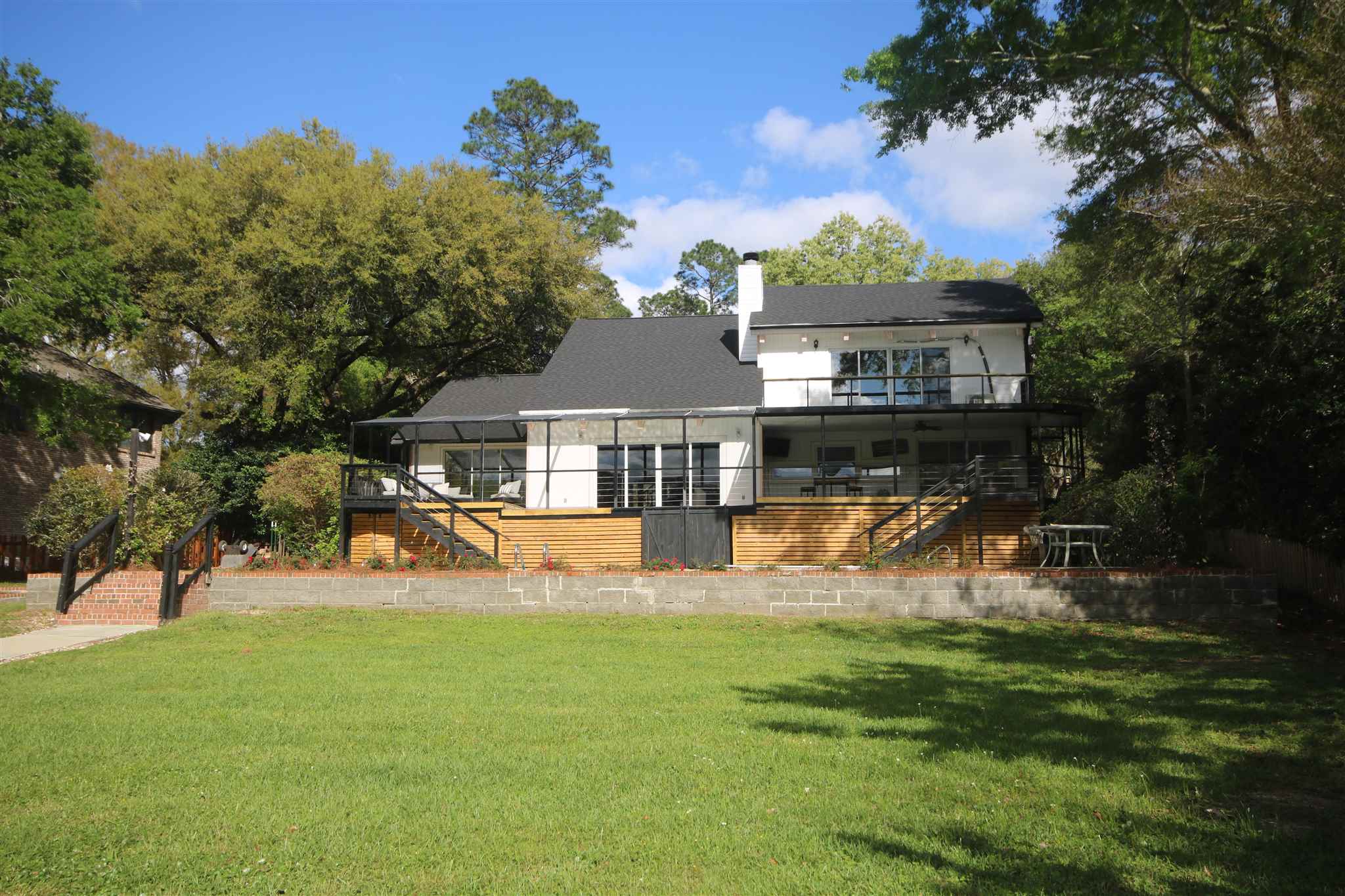 5425 Rowe Trail Pace, FL 32571 - Photo 8 of 50 a view of a house with swimming pool and sitting area