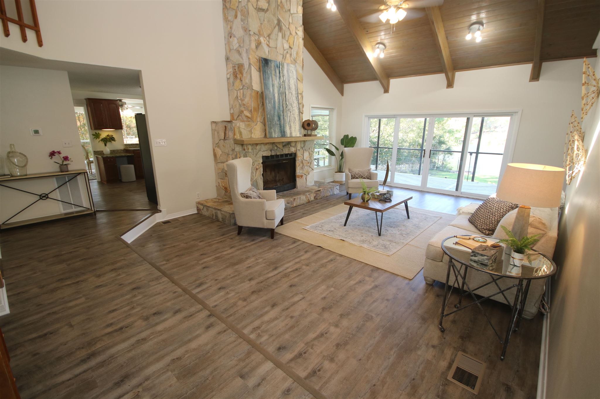 5425 Rowe Trail Pace, FL 32571 - Photo 9 of 50 a living room with fireplace furniture and a large window