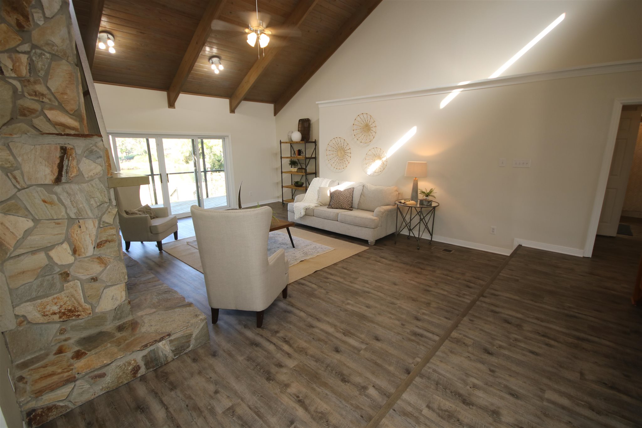 5425 Rowe Trail Pace, FL 32571 - Photo 10 of 50 a living room with couches and painting on the wall
